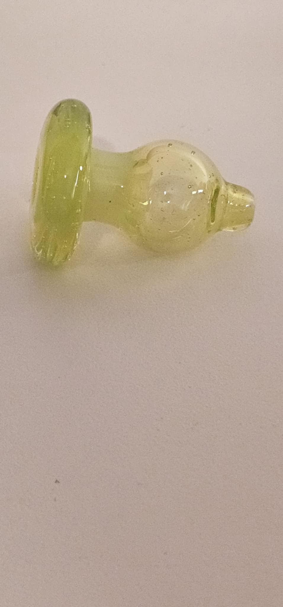 Translucent lime bubble cap for smooth and controlled dabbing experience