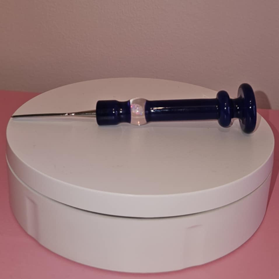artistic handblown glass dab tool with smooth non stick surface