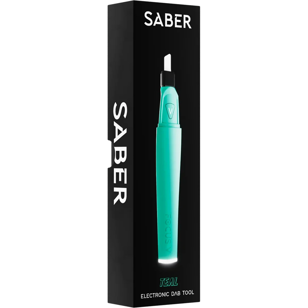 Focus V Saber hot knife dab tool teal in use with concentrates