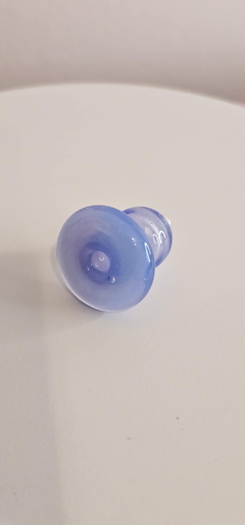 Close-up of periwinkle glass bubble carb cap borosilicate detail