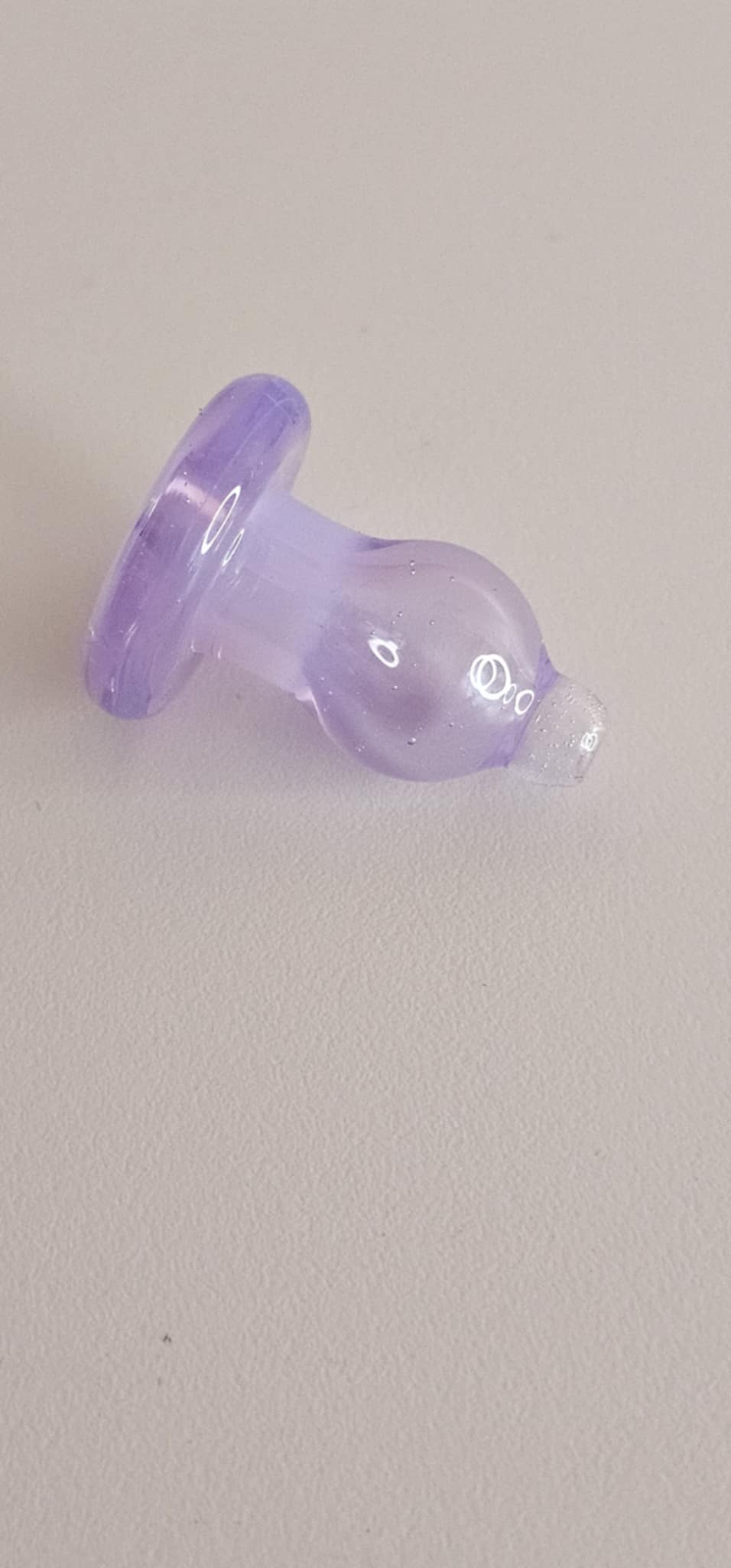 Lavender Padd Glass Bubble Cap for directional airflow control during low-temperature dabbing sessions