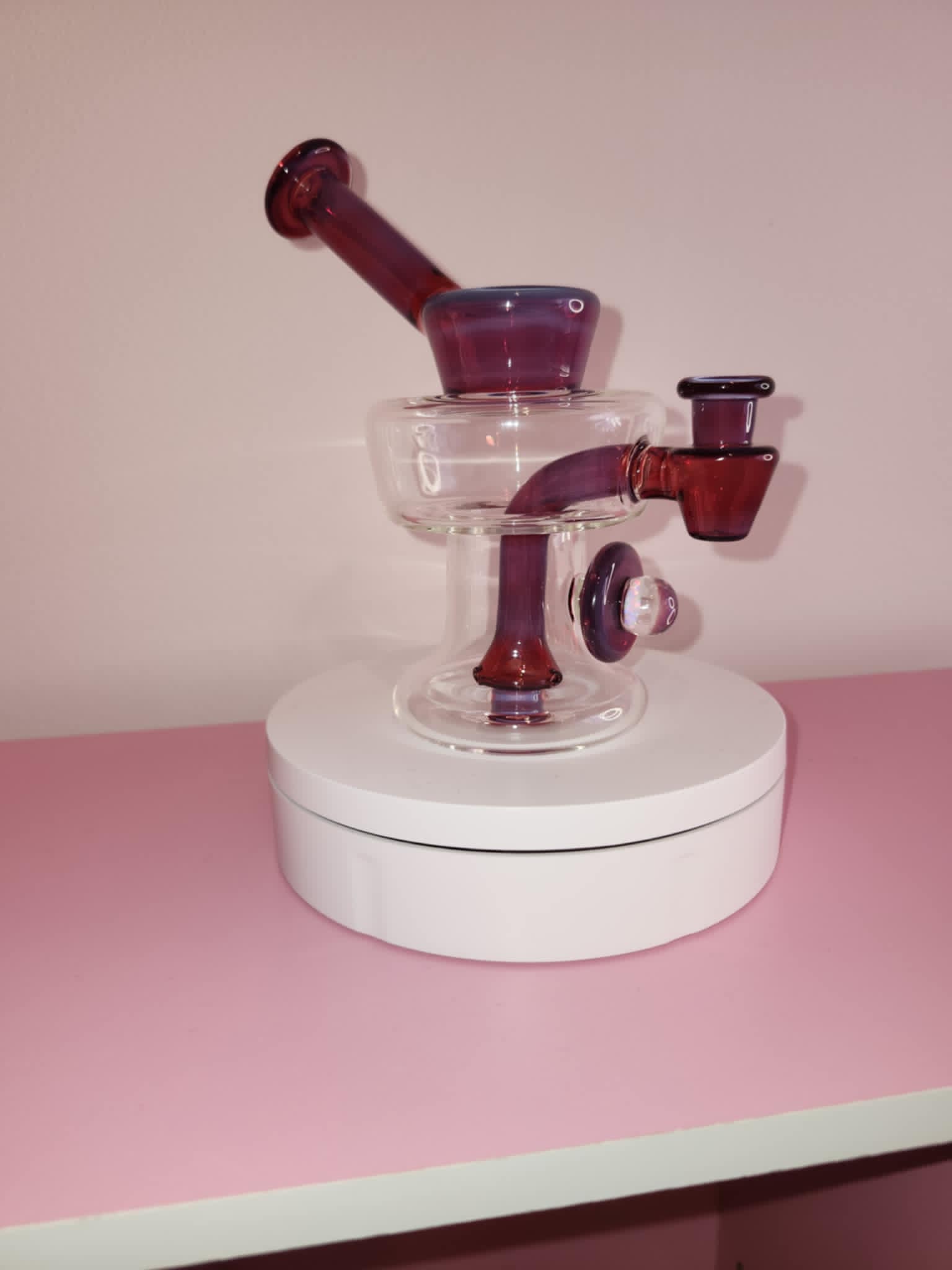Mac Savage Urn Rig Ruby featuring deep ruby glass body with sculpted urn shape and fixed joint on display