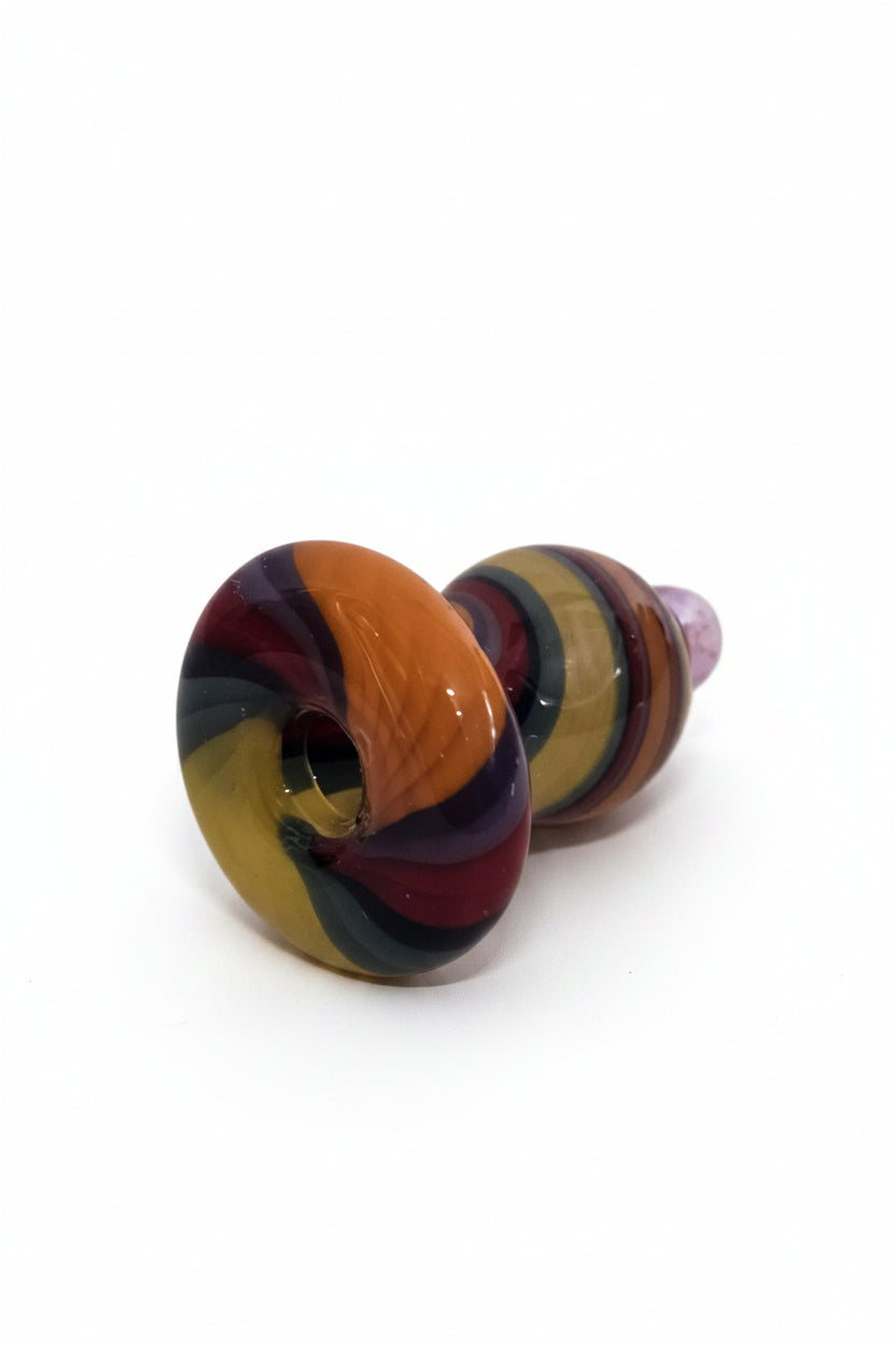 Rainbow Swirl Bubble Carb Cap used during dab session for airflow control