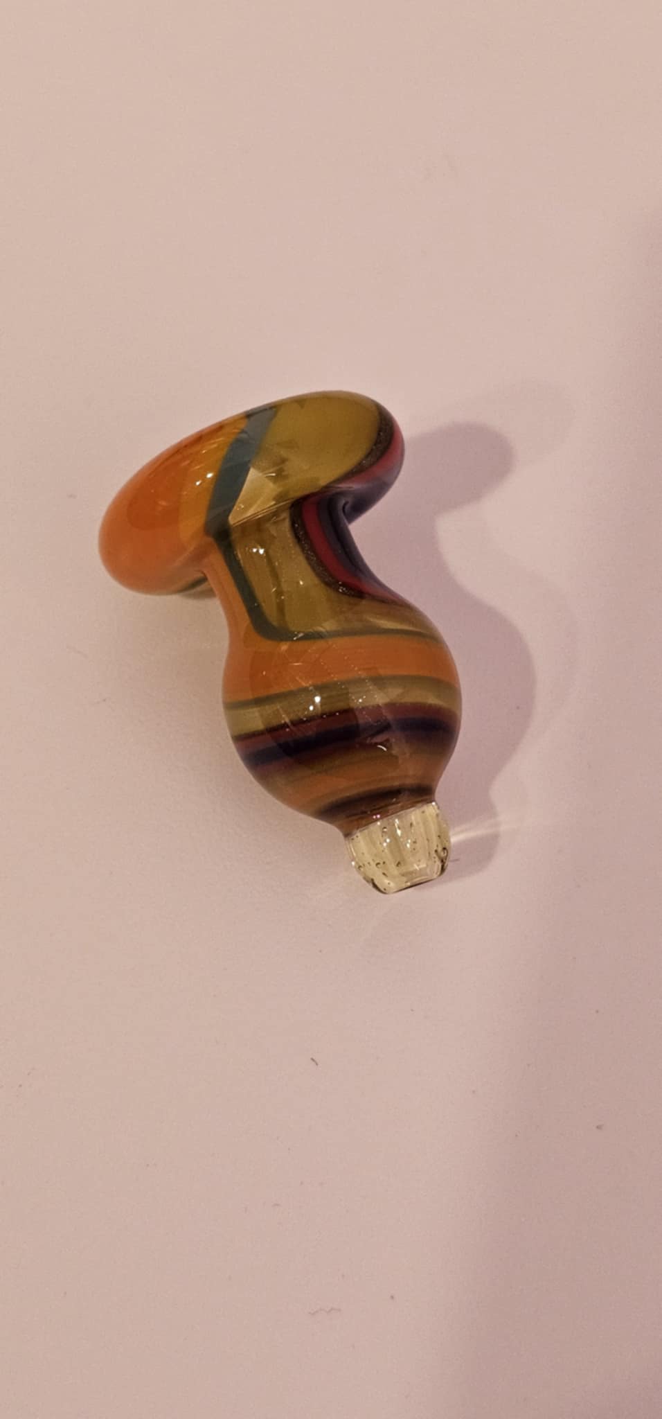Swirl bubble carb cap used on dab rig for directional airflow control