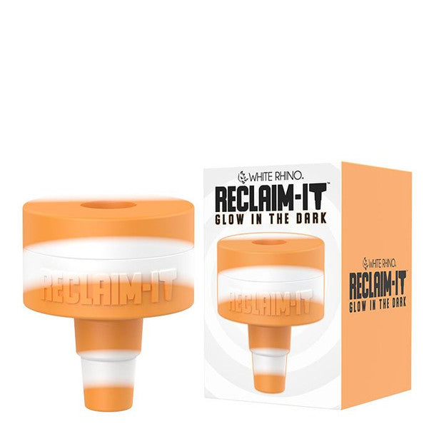 White Rhino Reclaim It glow dab tool placed beside dab rig setup for practical concentrate use